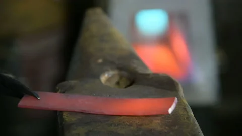 Forging a knife in the smithy. Close-up. Stock Footage 89882611