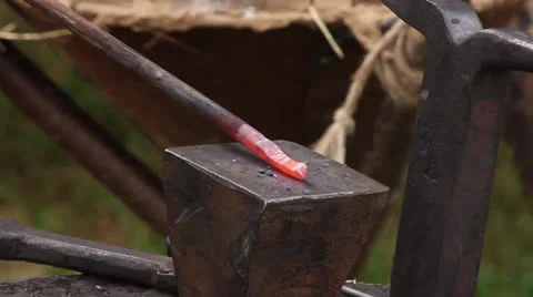 Forging a nail on the anvil Video stock 25877159