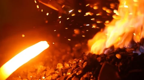 Forging a Swords with Fire Sparks Stock Footage 51639775