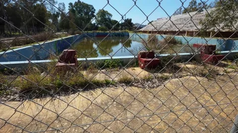 Forgotten Public Pool Left to Decay After Natural Disaster Video stock 304697370