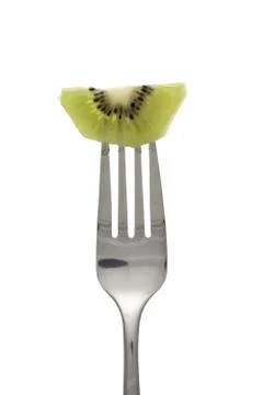 Fork and kiwi Stock Photos