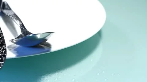 Fork and knife on the plate Stock Footage 8924155