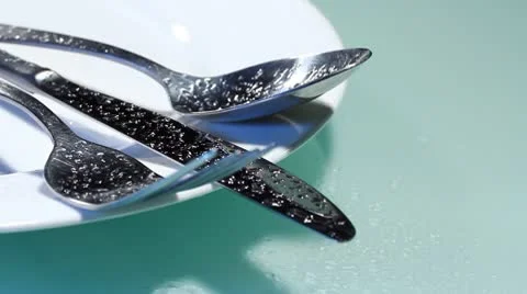 Fork and knife on the plate Stock Footage 8926952