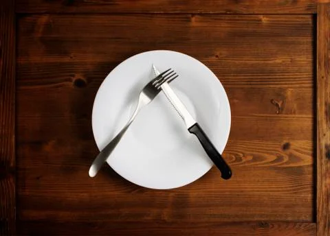 Fork and knife symbol setting for saying that untasty food. Stock Photos