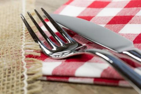 Fork and knife on table Stock Photos