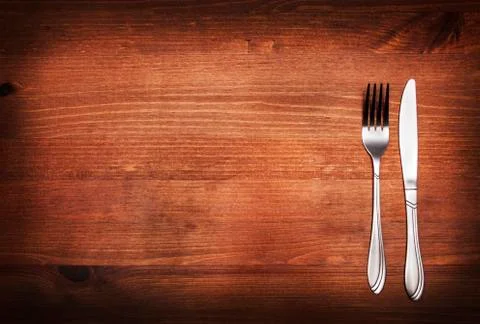 Fork and knife on table Stock-Fotos