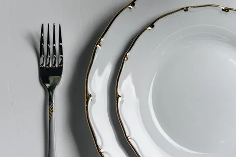 Fork and plate Stock Photos