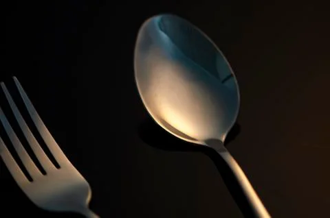 Fork and silver spoon on dark background Stock-Fotos