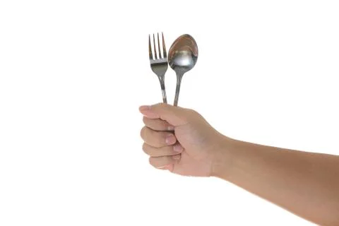 Fork and spoon held by a man's hands isolated Stock Photos