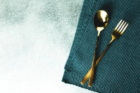 Fork and spoon on table background with space Stock Photos