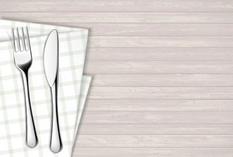 Fork and table knife on a napkin. Wooden table. 스톡 일러스트