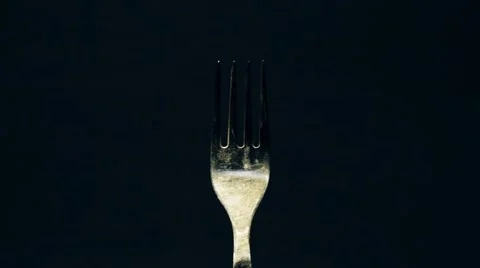 Fork on a black background Stock Footage 68374894