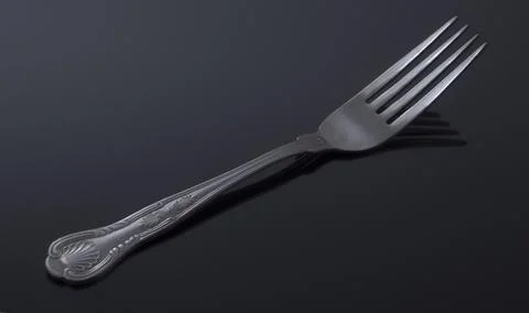 Fork on black background 스톡 사진