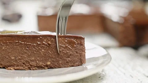 Fork breaks off a piece of no bake chestnut cake. Stock Footage 161015980