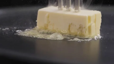 Fork with butter on a pan Stock Footage 85075337