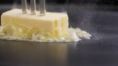 Fork with butter on a pan Stock-Footage 85075368