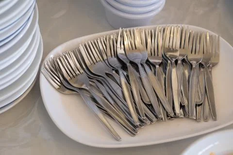 Fork on dish background in a kitchen Stock Photos