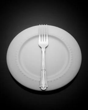 Fork on a empty plate Kitchen Utensil Stock Photos