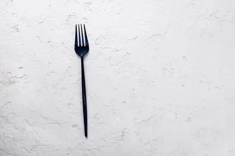 Fork on gray background Stock Photos