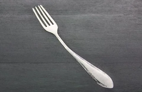 Fork hammered in table design Stock-Fotos