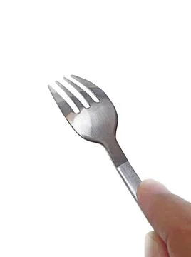 Fork in hand on white background Foto stock