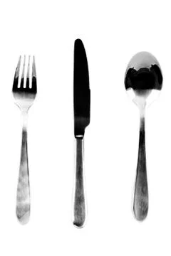 A fork, knife, and spoon on white Foto stock