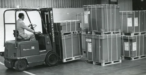 Fork lift loading, 1980s Fotos Stock