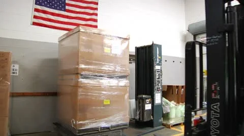 Fork lift moves large boxes Stock Footage 8912385