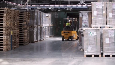 Fork lifter work in big warehouse. Clip. Warehouse man worker with forklift Stock-Footage 93161698