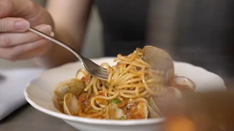 Fork Lifting Seafood Spaghetti from Plate Stock Footage 346676831