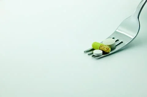 Fork with medicines Stock Photos