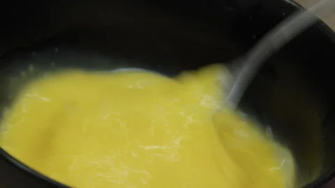 A fork mixing eggs in a bowl. Stock Footage 266422691