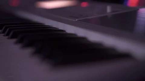 Fork piano key selectively focused and lightened by laser lights Stock Footage 71468726