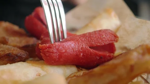 Fork Picking Up a Fried Sausage from a Platter Vídeos de archivo 340723265
