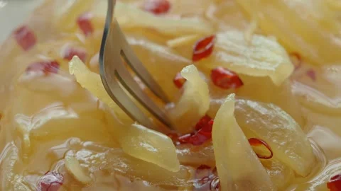 Fork Picking Up mango Pickled Slices with Chili 스톡 동영상 344024350