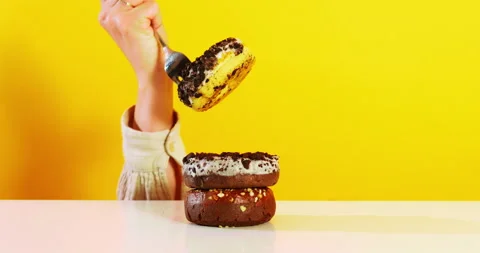 Fork Picking Up Stacked Donuts Stock Footage 310764270