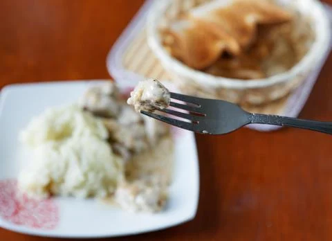 Fork with a piece of meat close-up Stock Photos