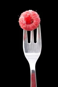 Fork with raspberry Фото