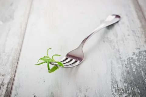 Fork with rosemary Stock Photos