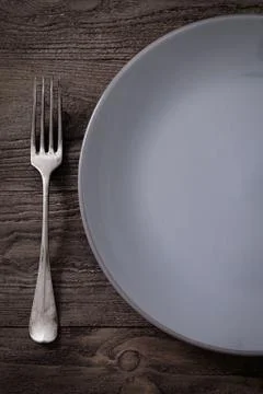 Fork in rustic table setting Stock Photos