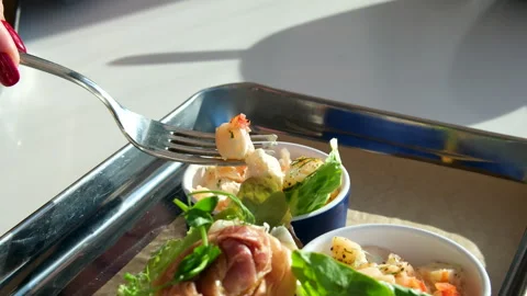 Fork salad appetizer. shrimp salad prosciutto sandwich Stock Footage 314099592