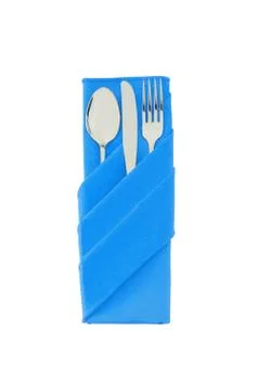 Fork, spoon and knife in blue cloth isolated on white Fotos Stock