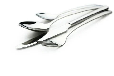 Fork, spoon and knife isolated on white Stock Photos