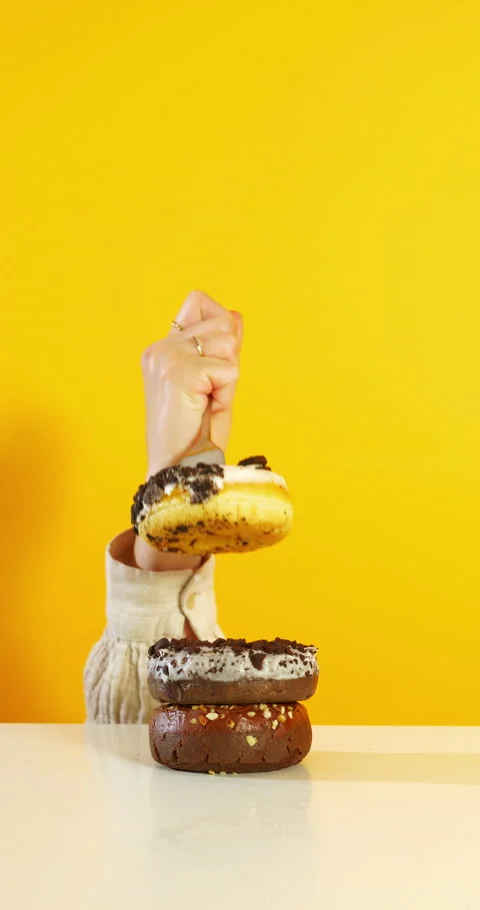 Fork Stabbed Into Donut Stack 動画素材 310937696