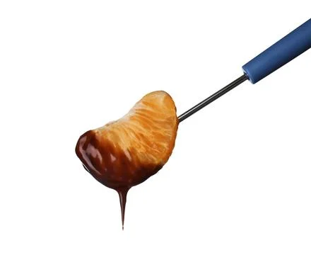 Fork with tangerine segment dipped into chocolate fondue on white background Stock Photos