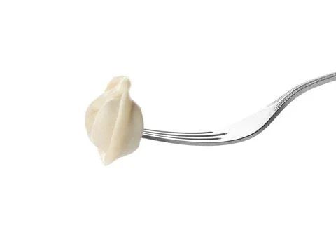 Fork with tasty dumpling isolated on white Stock Photos