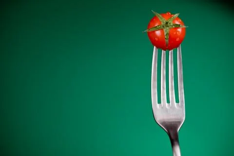 Fork with tomato Stock Photos