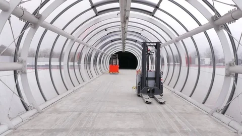 Forked Automatic Guided Vehicles (AGV) pallet truck, unmanned driving, 4K Stock Footage 72669255