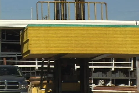 Forklift carrying lumber Stock Footage 157763