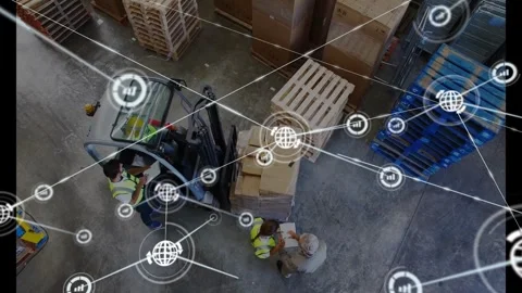 Forklift driver lifting pallet while woman checking docs sparking logistics Stock Footage 329899731